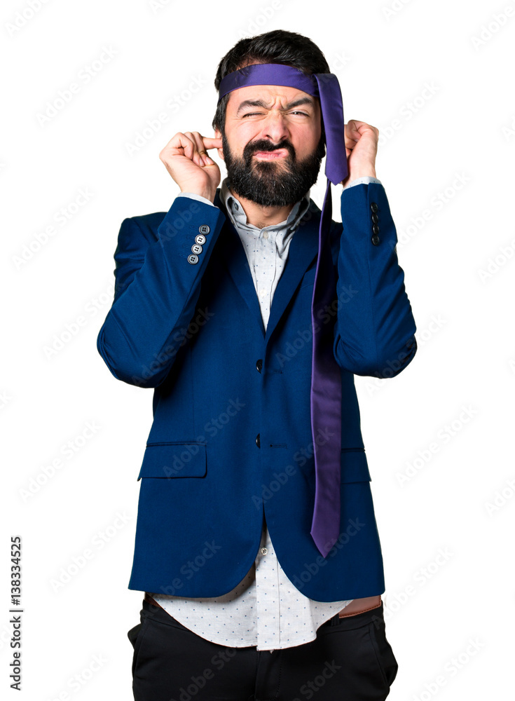 Crazy and drunk businessman covering his ears Stock Photo | Adobe Stock