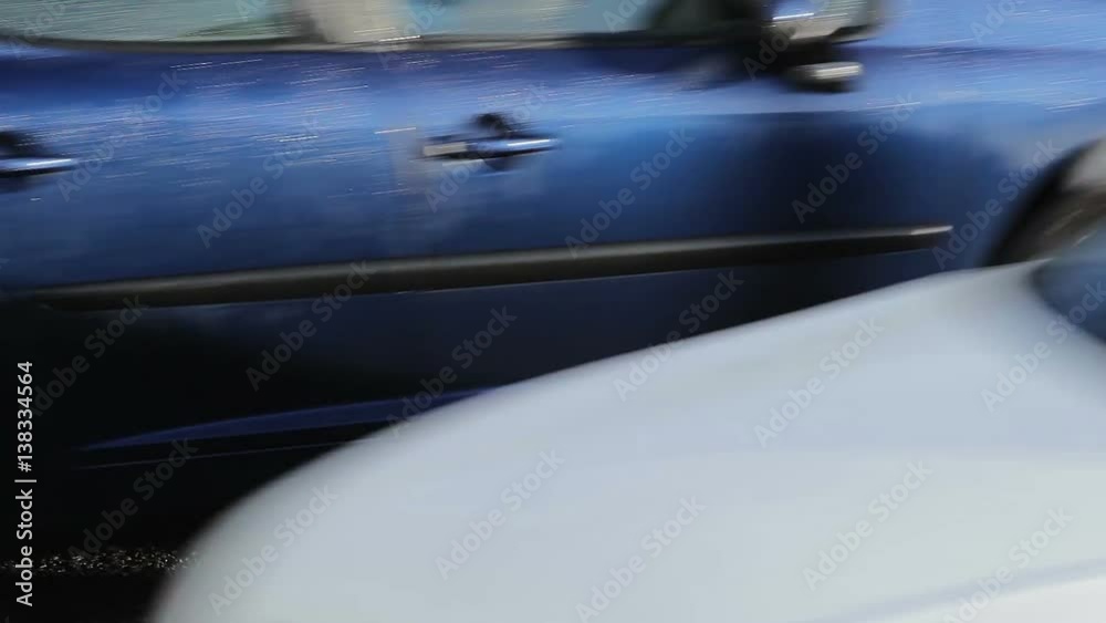 Close Up of Wheels Traffic Cars Rush Hour Road Lights Rainy Wet Day Close Up of Wheels Traffic Cars Rush Hour Road Lights Rainy Wet Day