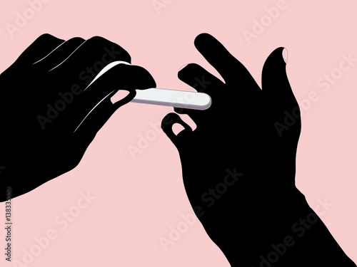 grooming of nails on a man's hand. black hand on pink background