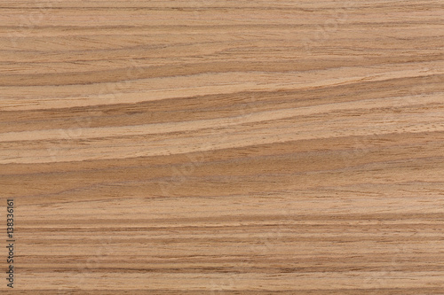 Walnut wood background texture on macro.