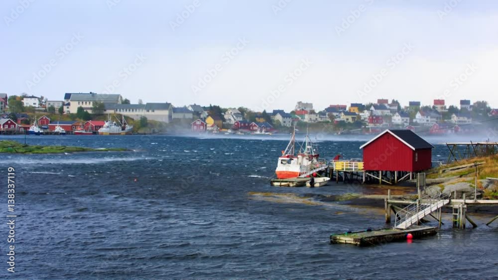 Fishing boats on strong wind in in the Gulf of Reine in Lofoten Fishing boats on strong wind in in the Gulf of Reine in Lofoten