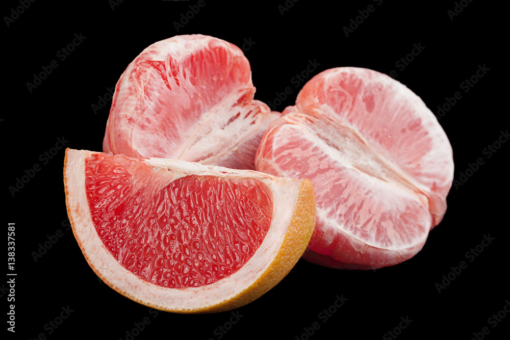Orange grapefruit on black background