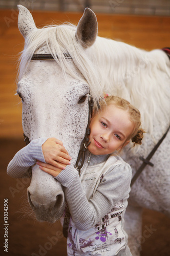 The child and the horse.