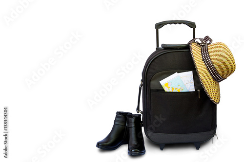 Concept of traveling with suitcase, hat and shoe