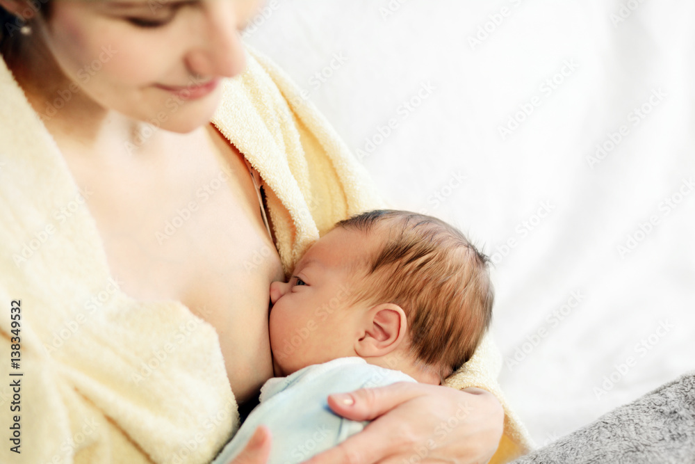 Mother breastfeeding her baby Mother breastfeeding her baby