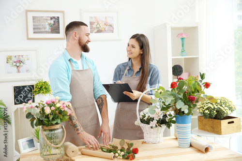 Male and female florists at...