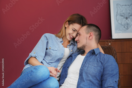 Young couple sitting together