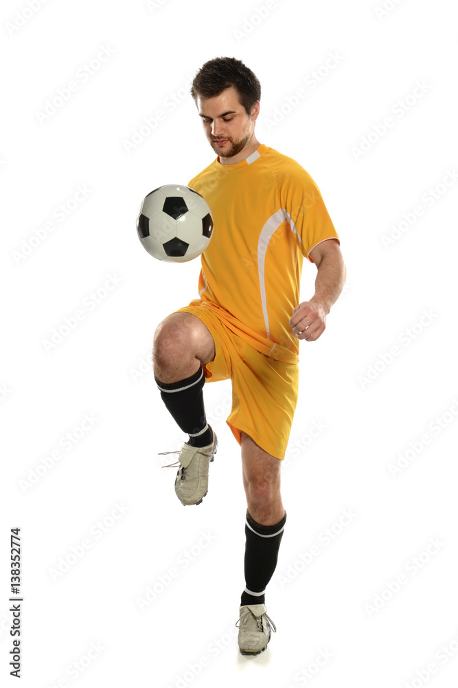 Soccer Player Bouncing Ball on Knee Soccer Player Bouncing Ball on Knee