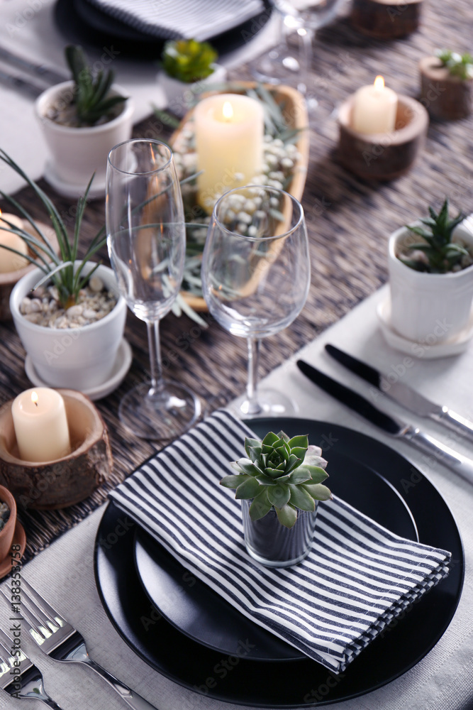 Table served with succulents for dinner Table served with succulents for dinner