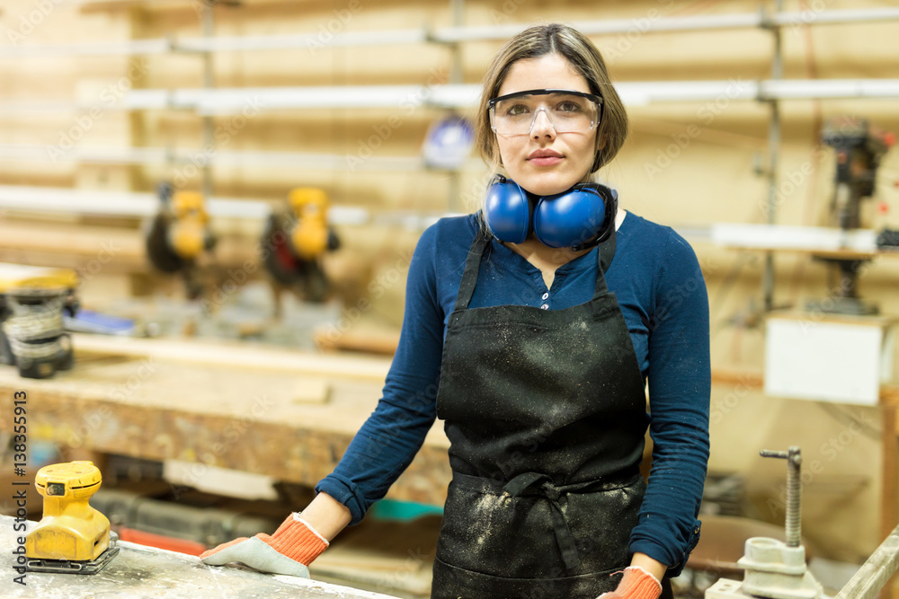 Carpenter wearing protective glasses