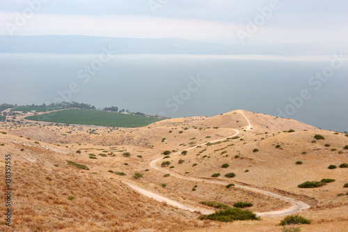 Shore of Lake Kinneret  the slopes of the Golan Heights in Israel