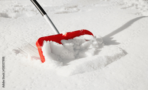 Red shovel for snow removal