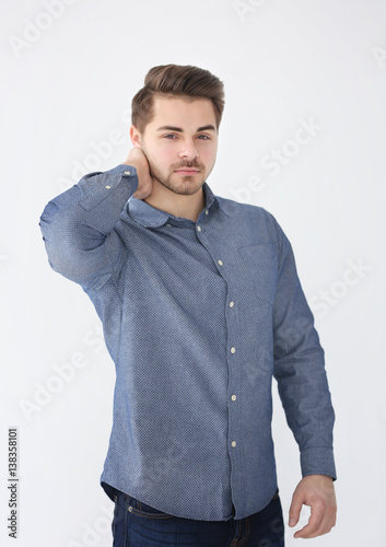 Handsome young man on light...