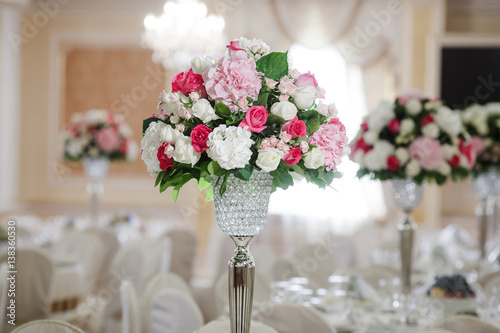 flower arrangement white tablecloth