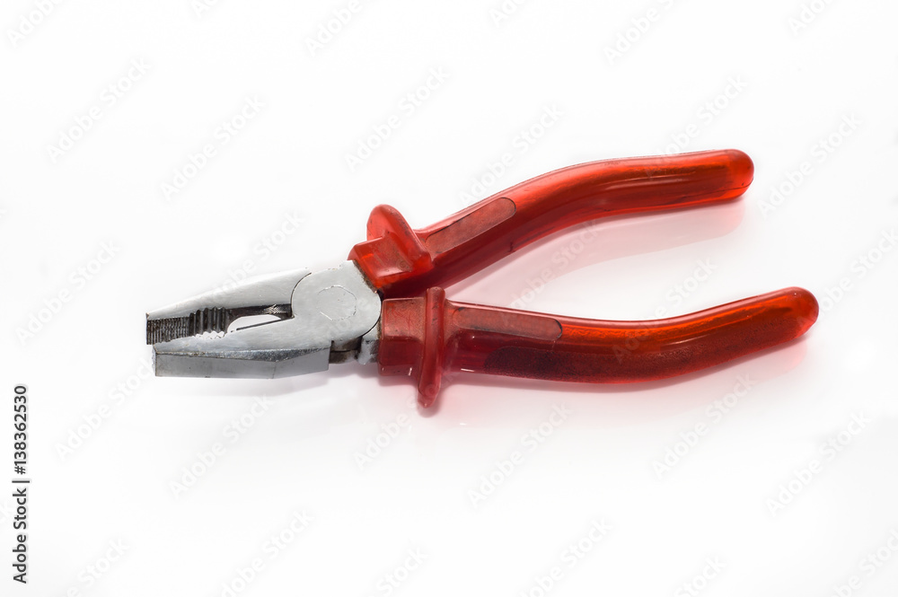 Red pliers isolated on white background, work tools concept