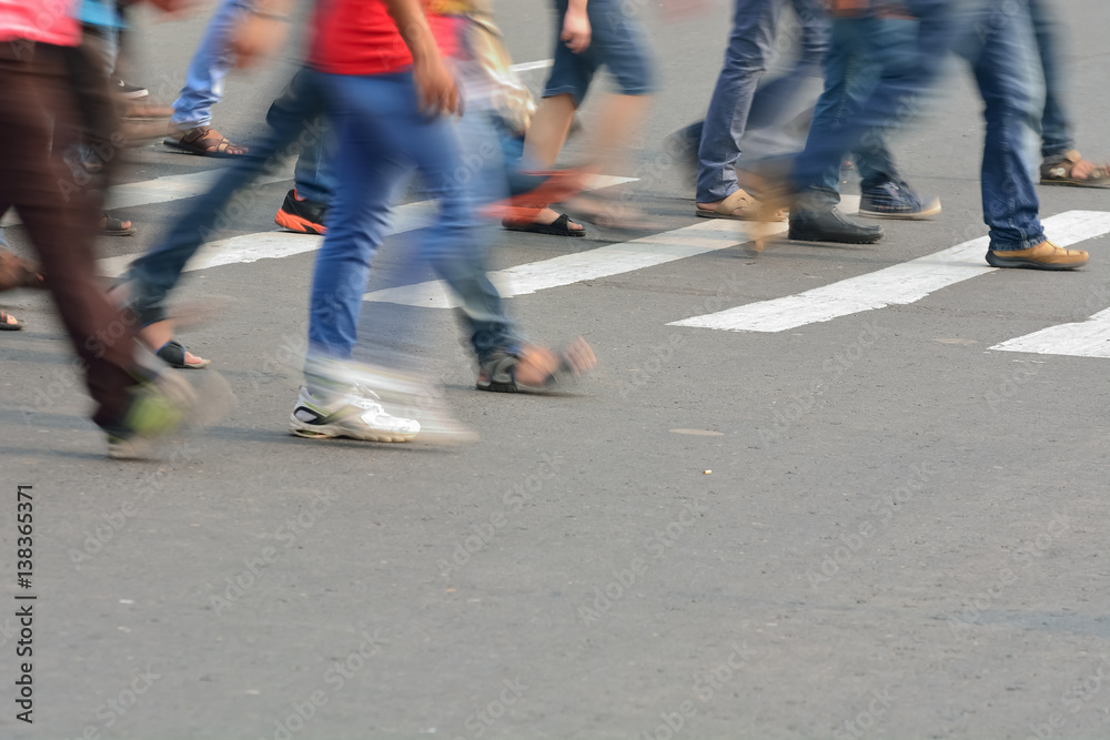 Pedestrian are crossing in zebra crossing
