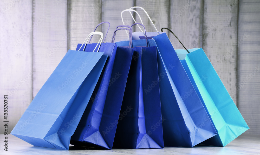 Composition with blue paper shopping bags