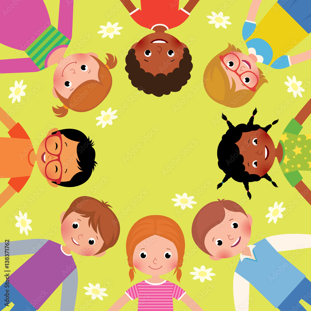 Large group of friends happy children lying on the grass Large group of friends happy children lying on the grass
