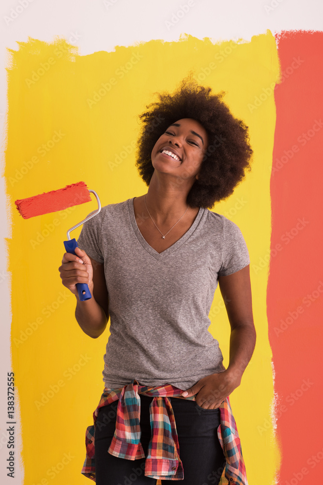 © .shock - black woman painting wall © .shock - black woman painting wall