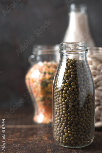 Banks with beans and lentils, rice in line photo