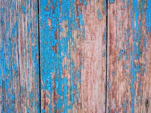 old wooden surface with peeling paint