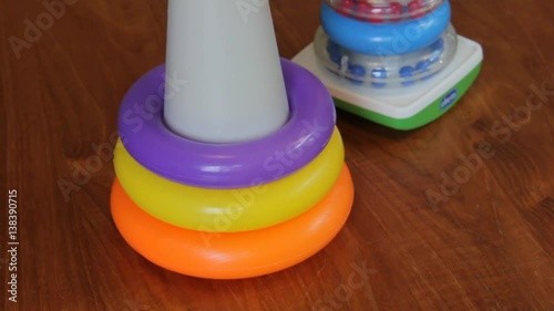 Wallpaper Mural Male Hand Plays With Rings of Pyramid Toy Torontodigital.ca