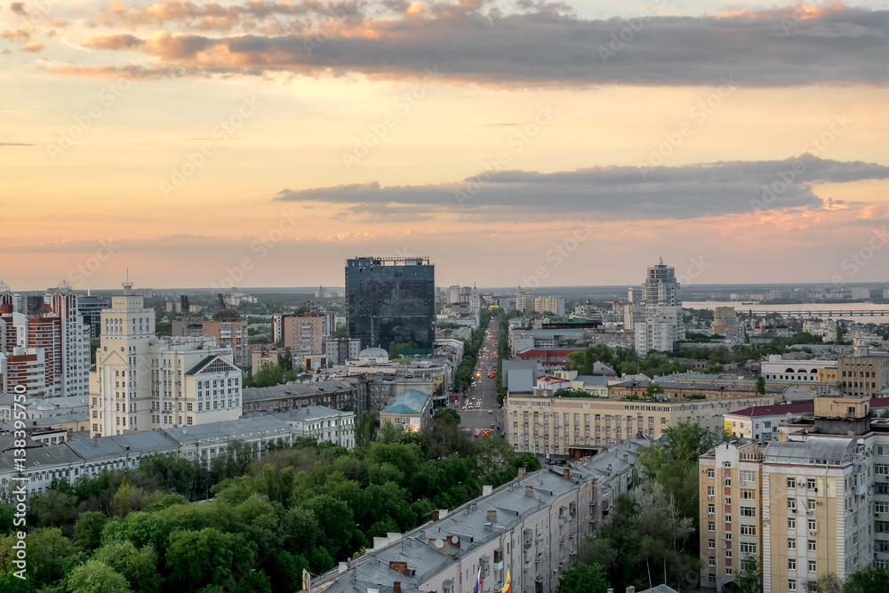 Evening summer cityscape in Voronezh, colourful sky at sunset light Evening summer cityscape in Voronezh, colourful sky at sunset light