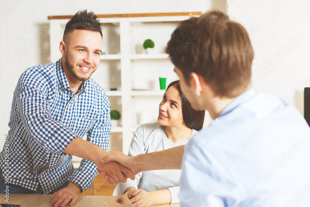 Fototapeta premium Young male accepted for a job