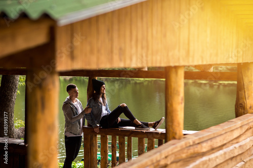 Young couple in casual denim wear walking outdoor