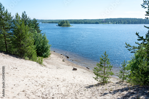 Niperna i Karlsvik med sin långa sandstrand och Gäddvik på andra sidan photo