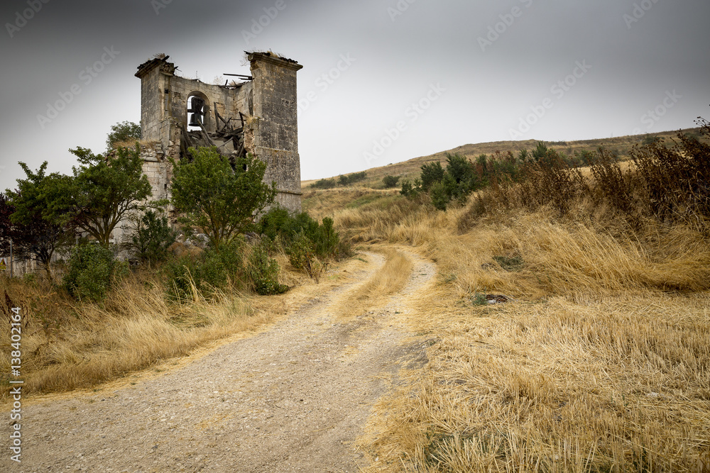 ruins of Virgen del Rosario church on a cloudy summer day in Villalval, Burgos, Spain