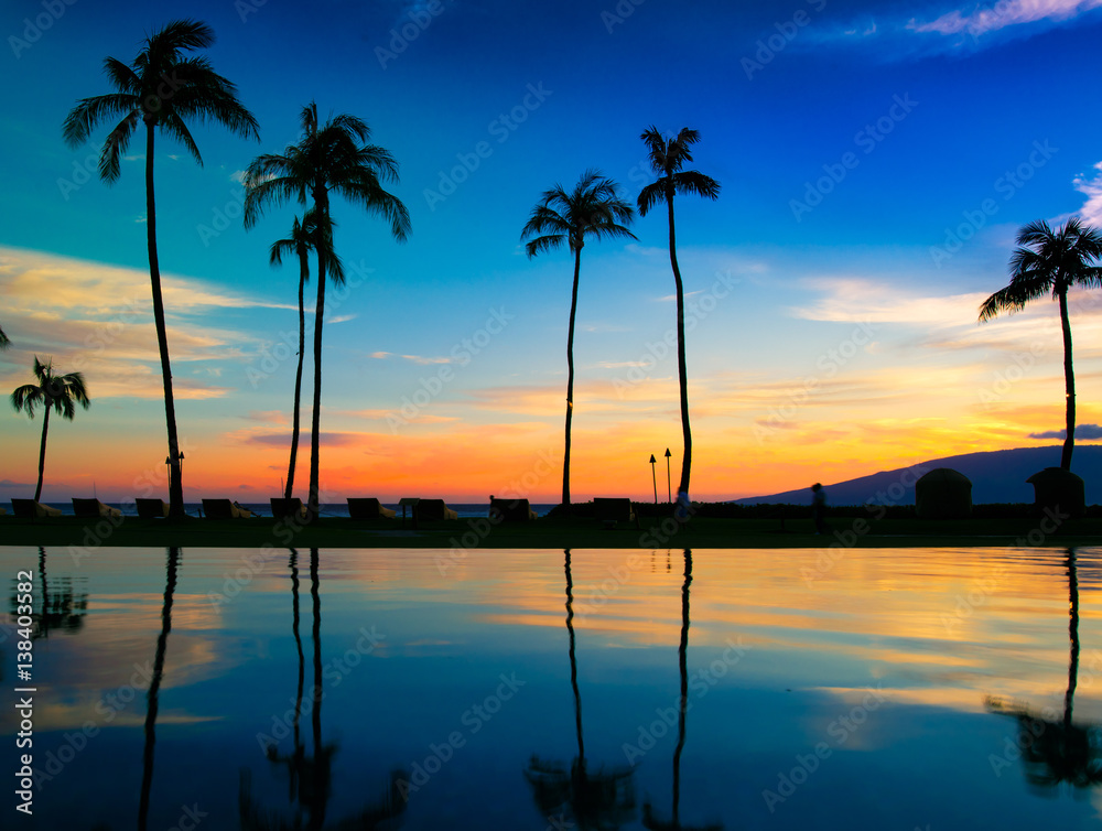Hawaiian sunset over pool