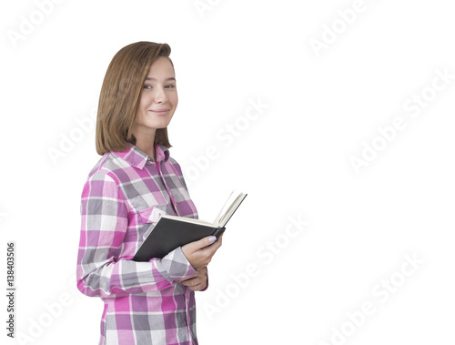 Isolated girl with book in pink