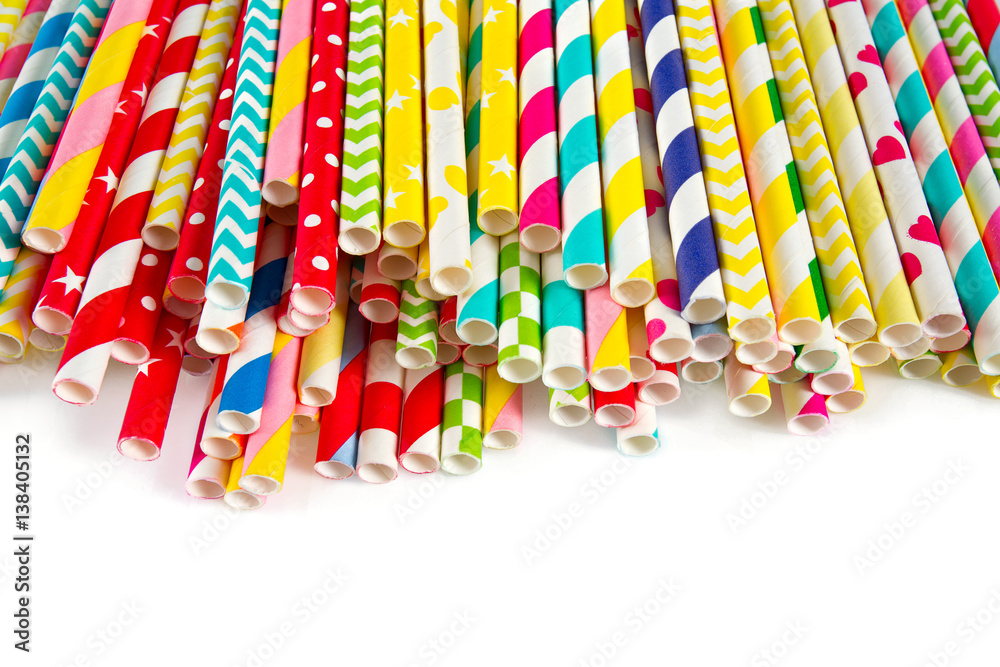 Obraz premium multicolored paper straws on white background