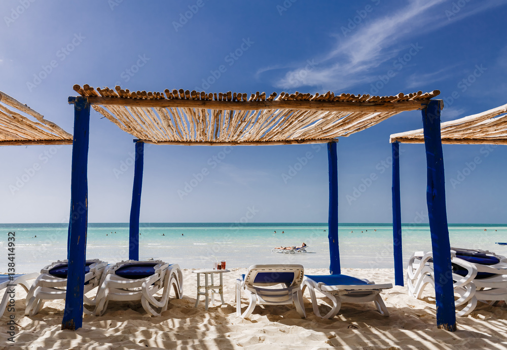 great amazing beautiful view of Cuban Cayo Coco island beach with people relaxing in background on sunny gorgeous day