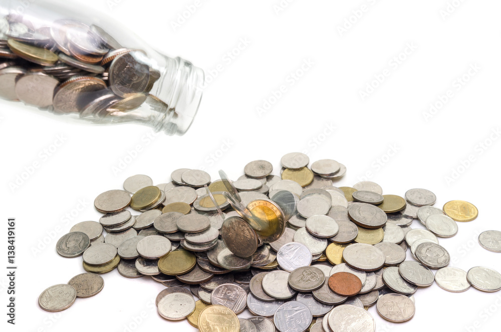 Saving money concept of collecting coins in glass bottle Isolated on white background. Saving money concept of collecting coins in glass bottle Isolated on white background.