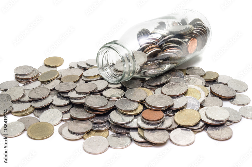 Saving money concept of collecting coins in glass bottle Isolated on white background. Saving money concept of collecting coins in glass bottle Isolated on white background.