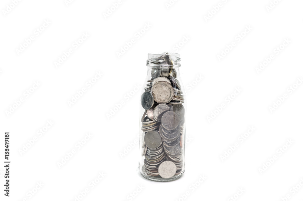 Saving money concept of collecting coins in glass bottle Isolated on white background.