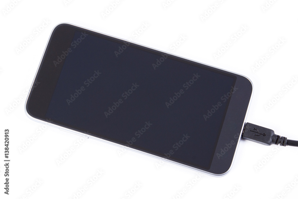 Mobile phone with connected plug of charger, smartphone charging Mobile phone with connected plug of charger, smartphone charging