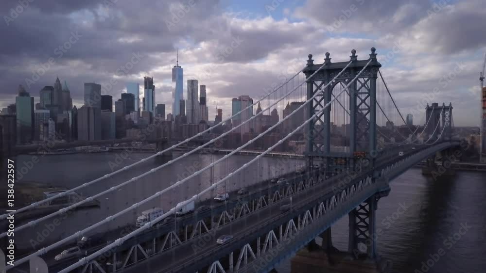 cloudy flying left towards Manhattan Bridge with NYC in BG cloudy flying left towards Manhattan Bridge with NYC in BG