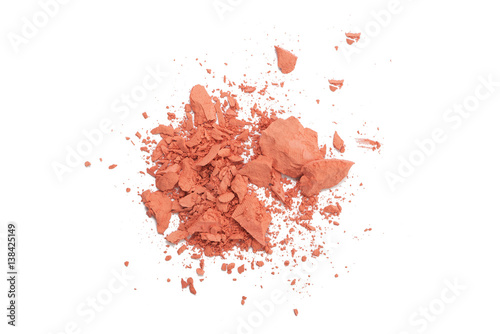 Orange color Face make up powder cracked on background
