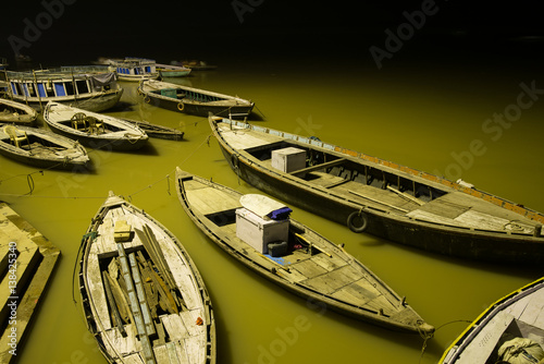 Boats on a river Ganges in Varanasi city © Olja