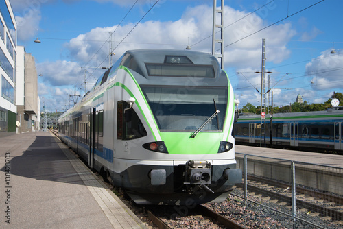 Modern high-speed train at the platform of the railway station. Helsinki, Finland
