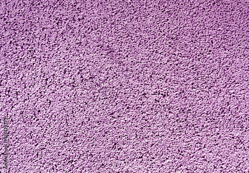 Purple color cement wall pattern.