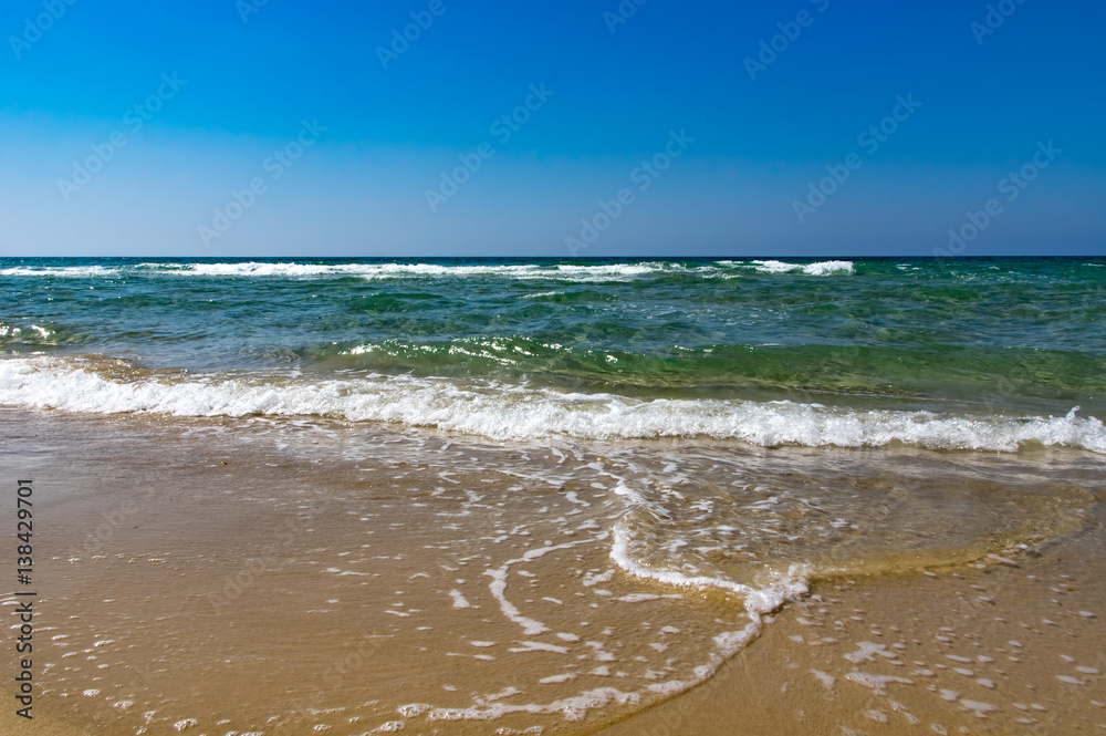 Peaceful ocean wave at beach.
