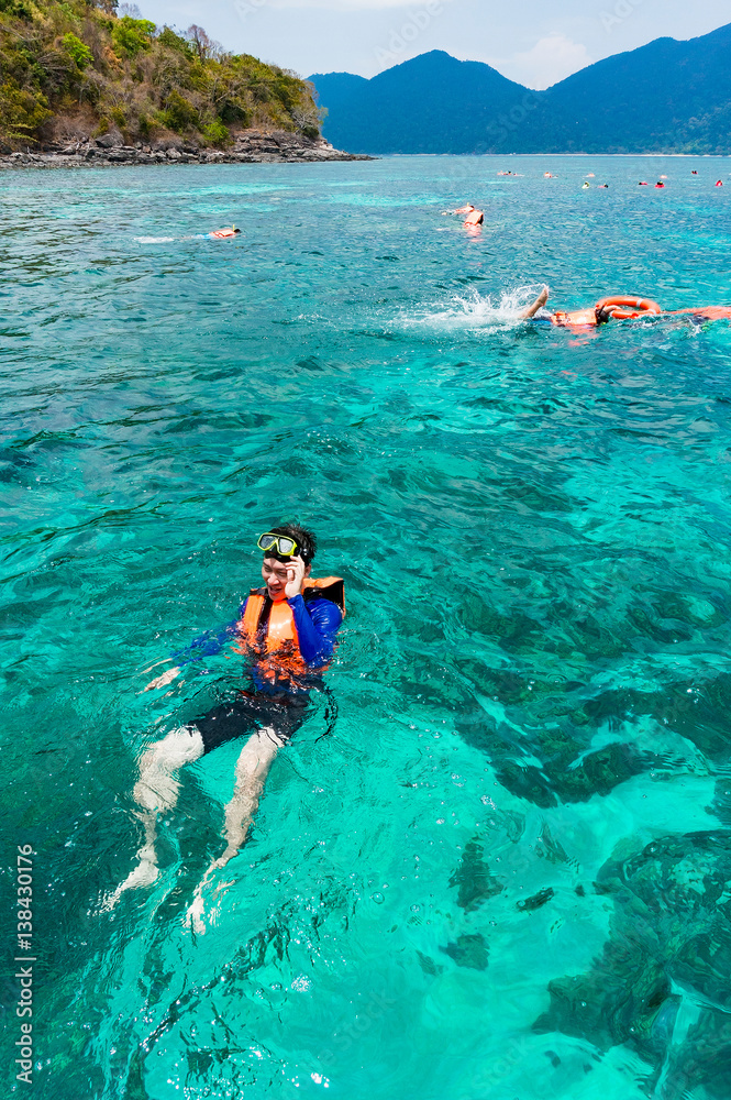 Tourist Snorkeling on Lipe island, Thailand.