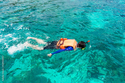 Tourist Snorkeling on Lipe island, Thailand.