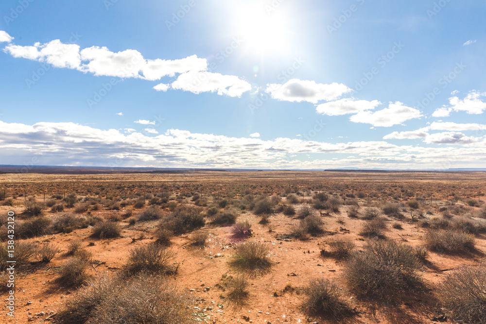 Remote desert landscape under bright sun