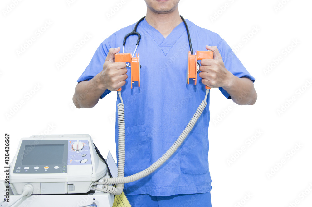 Foto Stock doctor hold paddle defibrillators and EKG monitors Adobe Stock