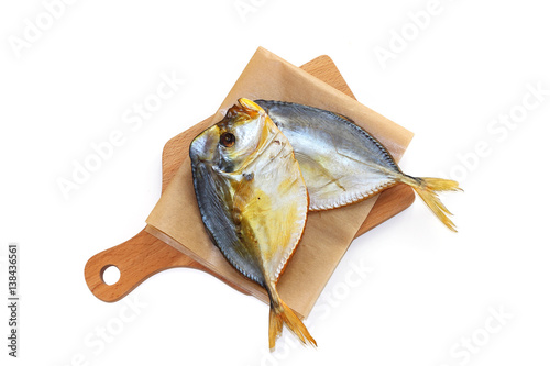 Smoked fish on white background photo